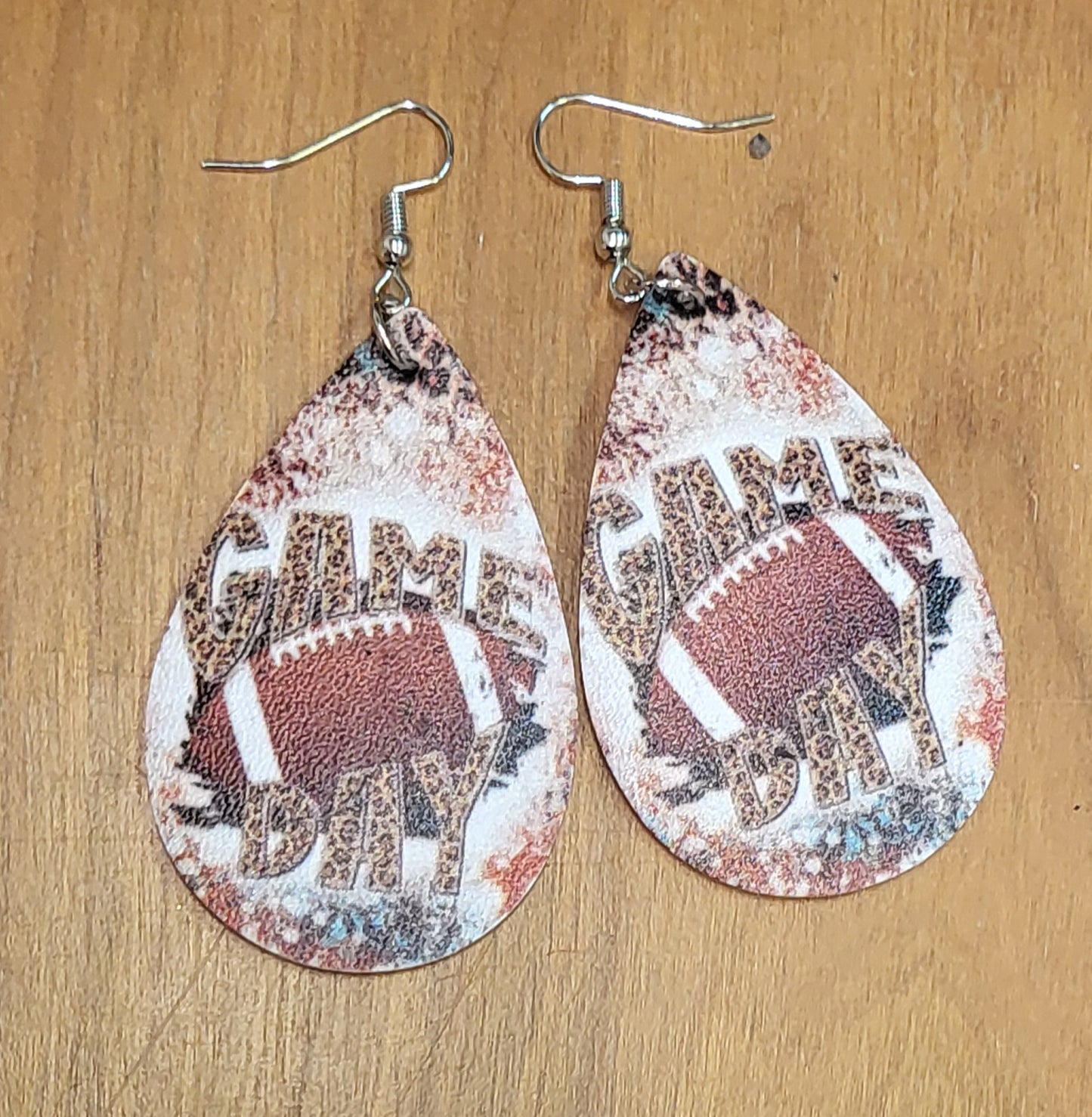 Football soccer baseball softball faux leather tear drop earrings