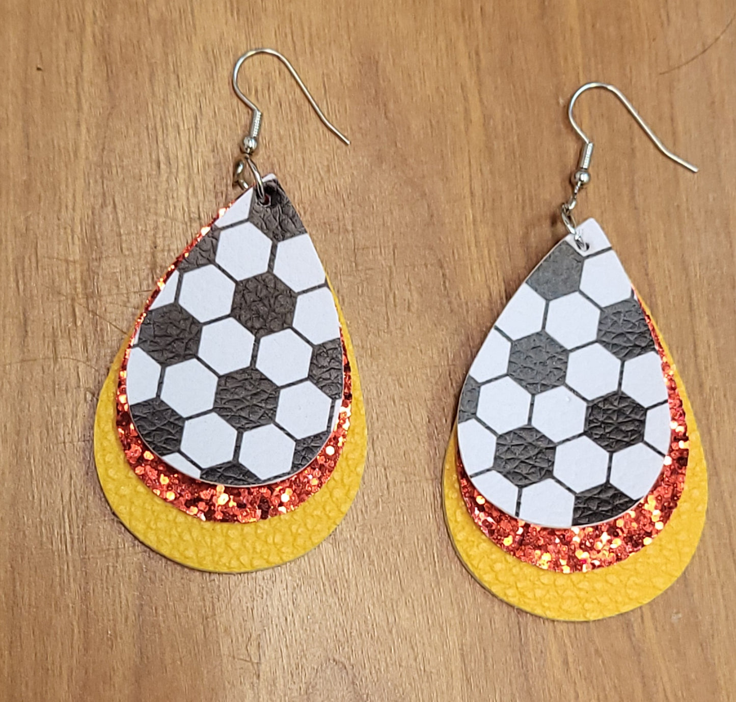 Football soccer baseball softball faux leather tear drop earrings